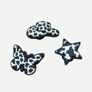 Pin's pour Clogs - Motif Vache Noir & blanc